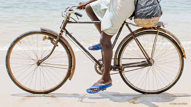 Cyclist on the beach Pashakuda